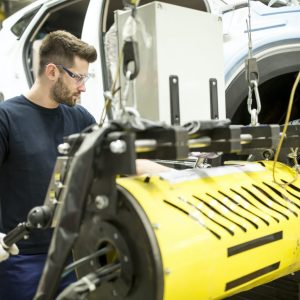 man-working-in-modern-car-factory.jpg